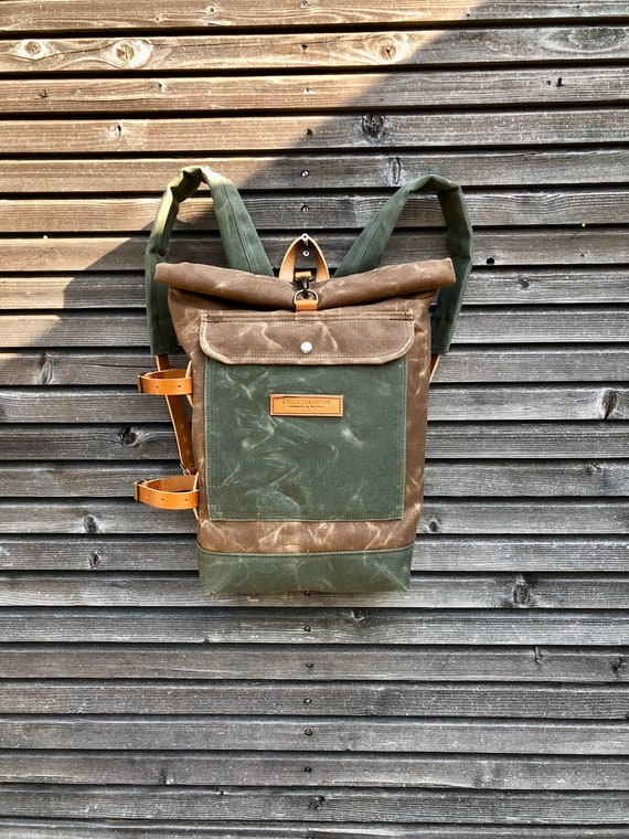 Sac à dos en toile cirée imperméable à leau avec sangles latérales en cuir  détachables et compartiment rembourré pour ordinateur portable / bretelles  rembourrées -  France