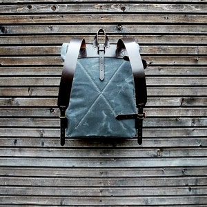 Waxed canvas backpack with roll to close top and vegetable tanned leather shoulderstraps image 4