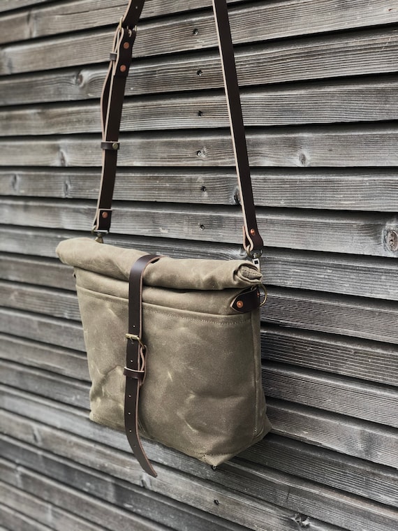 Double outlet canvas satchel