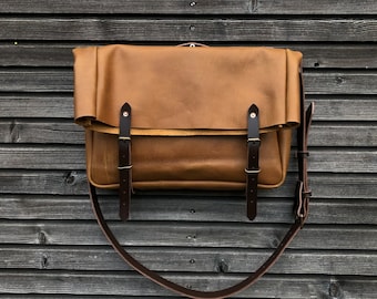 Leather messenger with folded top in oiled leather  Musette  Satchel with adjustable shoulderstrap