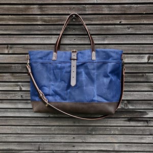 XL tote bag  made in waxed canvas  with leather handles and shoulder strap
