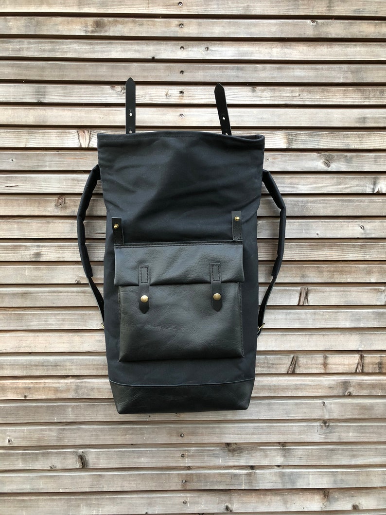 Black waxed canvas rucksack/backpack with roll top and leather bottem COLLECTION UNISEX image 3