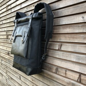 Black waxed canvas rucksack/backpack with roll top and leather bottem COLLECTION UNISEX image 2