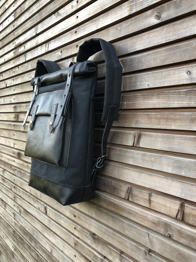 Black waxed canvas rucksack/backpack with roll top and leather bottem COLLECTION UNISEX image 2