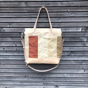 Diaper bag / Large tote bag in waxed canvas and leather with cross body strap COLLECTION UNISEX image 3