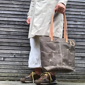 Waxed canvas tote bag with leather handles