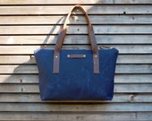 Waxed canvas bag/ carry all with  leather handles and zipper closure  COLLECTION UNISEX