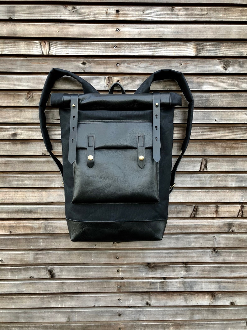 Black waxed canvas rucksack/backpack with roll top and leather bottem COLLECTION UNISEX image 1