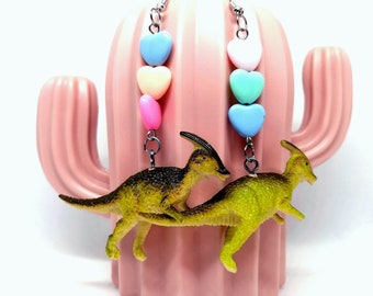 Dinosaur earrings! Handmade, with heart-shaped beads. Green dinosaur