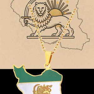 May include: Gold-colored necklace pendant in the shape of Iran, with green, white, and red enamel. The pendant features a lion and sun emblem. The background shows a map of Iran and the same emblem.