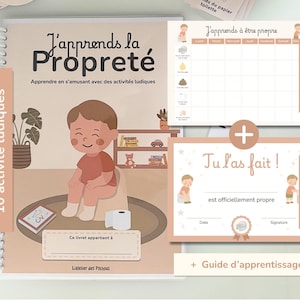 May include: A potty training kit for children, featuring a book titled "J'apprends la Propreté" and the text "Apprendre en s'amusant avec des activités ludiques." The kit includes a chart, a certificate, and a guide. The book has a cartoon illustration of a child.