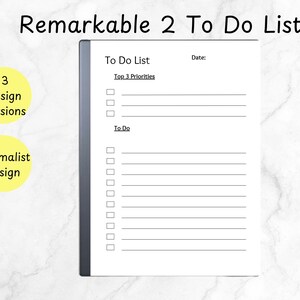 May include: A digital to-do list on a tablet. The screen displays a "To Do List" with sections for "Top 3 Priorities" and "To Do." The text "Remarkable 2 To Do List" is at the top. Additional text includes "3 design versions" and "Minimalist Design."