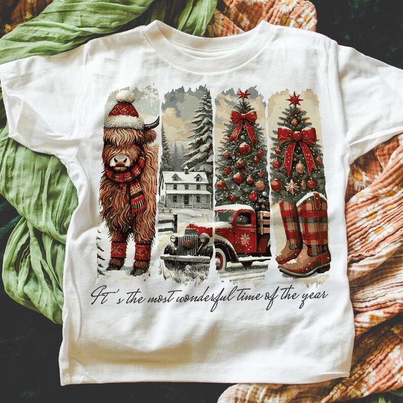 May include: White t-shirt featuring a festive Christmas design. The graphic includes a Highland cow in a winter hat and scarf, a snowy landscape, a red truck, a decorated Christmas tree, and plaid boots. The text "It's the most wonderful time of the year" is printed at the bottom.