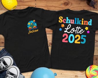 May include: Two black t-shirts with colorful graphics. One shirt has a book and floral design with the name "Jackson". The other shirt says "Schulkind Lotte 2025" in bright colors. Accessories include sunglasses, a pineapple, and a lollipop.