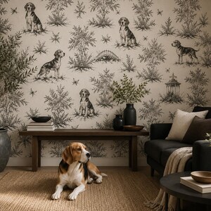 May include: Wallpaper featuring a repeating black and white toile pattern of beagle dogs, trees, and garden structures. The design includes various illustrations of dogs in different poses amidst foliage, set against a light cream-colored background.