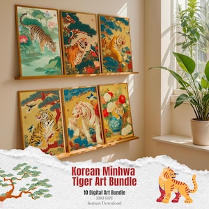 May include: Six framed Korean Minwha tiger art prints are displayed on wooden shelves. The artwork depicts tigers in various scenes with floral and natural elements. The prints are presented against a neutral wall.