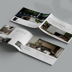 May include: Two open brochures with interior design photos and text. One brochure displays a bathroom, and the other shows a bedroom. The text includes "978 LUXEDALE MISSION ROAD SEATTLE 90123" and "MASTER BEDROOM."