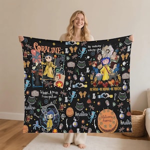 May include: Black blanket featuring illustrations and text from the movie "Coraline." The design includes characters, phrases like "My twitchy witchy girl," and the word "Coraline." The blanket has a repeating pattern of various elements from the film.