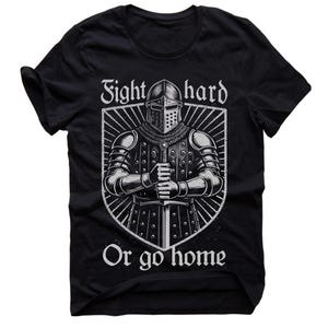 May include: Black t-shirt featuring a detailed illustration of a knight in full armor, holding a sword. The design includes the text "Fight hard" above the knight and "Or go home" below, all in a vintage style.