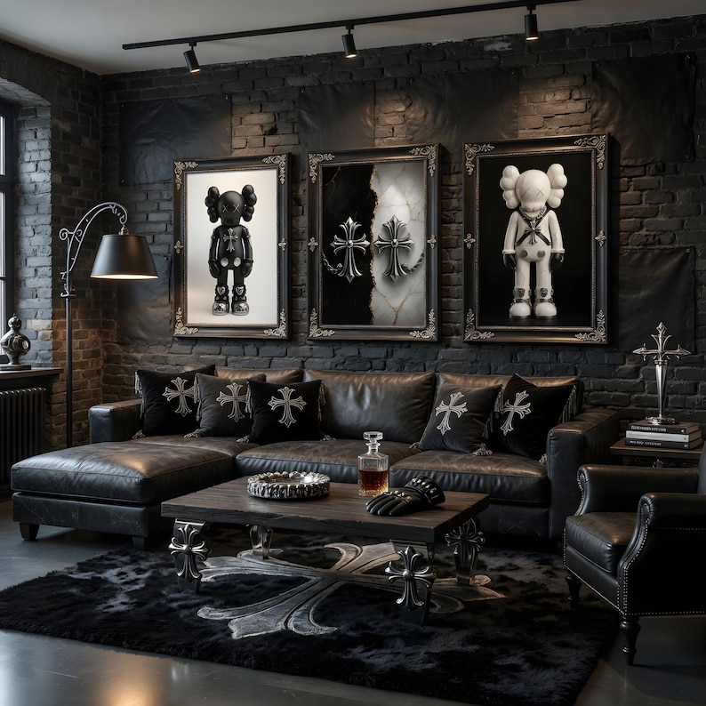 May include: A modern living room with a dark, gothic aesthetic. Features include a black leather sectional sofa, framed artwork, decorative pillows, a coffee table, and a patterned rug. The room is illuminated by track lighting and a floor lamp.