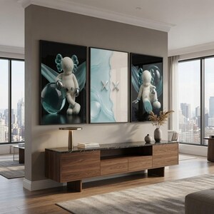 May include: A triptych wall art set featuring two outer panels with white cartoon figures against black backgrounds and a central panel with a light blue abstract wave design and two white X symbols, mounted above a long wooden media console.