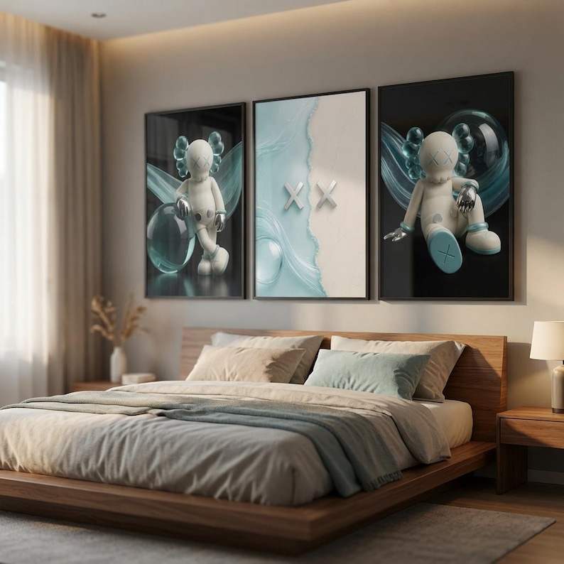 May include: A set of three framed wall art prints featuring a stylized white character with X-shaped eyes. The outer prints show the character against a dark background with teal accents, while the center print displays a light blue wave design with two silver X symbols.