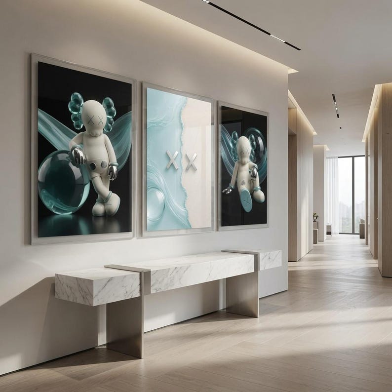 May include: Three framed wall art prints featuring a white cartoon character with X-shaped eyes. The outer prints show the character with teal accents and spheres against a black background, while the center print displays two silver X symbols.