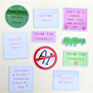 May include: A collection of ten stickers featuring various anti-AI slogans. Text includes: I want forests, not data centres, AI is for losers, DON'T BE A COWARD, MAKE YOUR OWN SHITTY ART, ChatGPT doesn't like u, THINK FOR YOURSELF, AI Slop, and I'd rather see shit human art than AI slop.