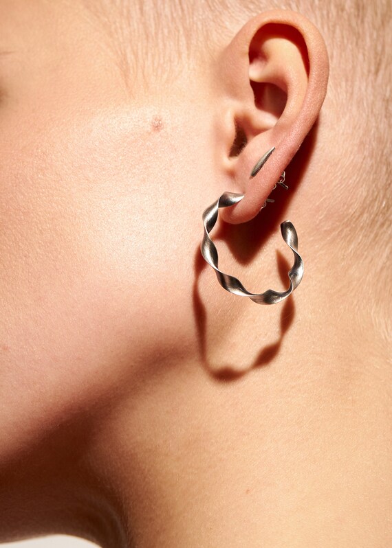 Sterling Silver Twisted Hoop Earrings 32mm Approximate Length Sterling Silver Twisted Hoop Earrings 32mm Approximate Length