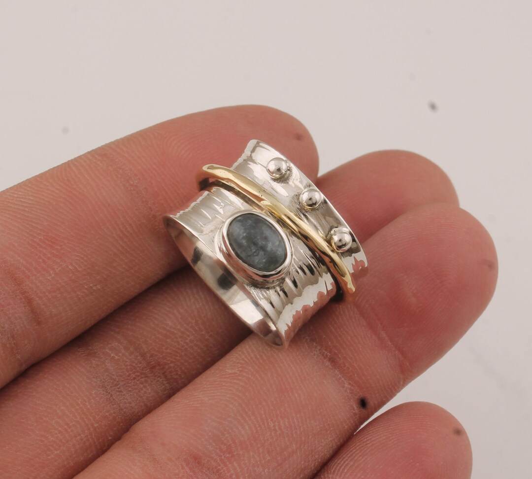 we took our beloved hand hammered band and made it... Aquamarine Silver Plated Spinner Ring: Hand Hammered Band - Etsy