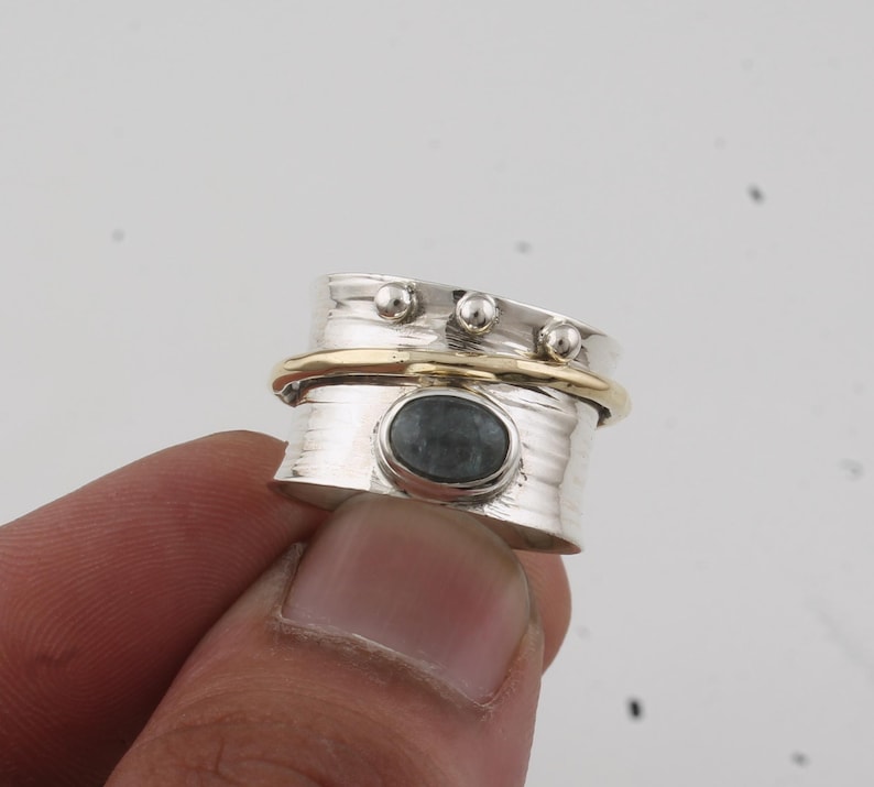 we took our beloved hand hammered band and made it... Aquamarine Silver Plated Spinner Ring: Hand Hammered Band - Etsy