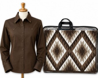 May include: A solid dark brown long-sleeve button-down shirt with a pointed collar and western-style yoke detailing, displayed alongside a rectangular carrying case containing a textile featuring a brown, tan, and white diamond pattern.