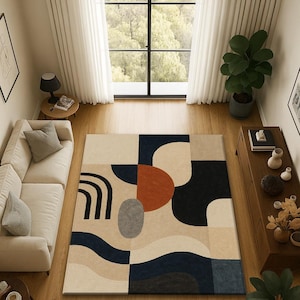 Alfombra geométrica abstracta moderna: alfombra para sala de estar de inspiración de mediados de siglo en colores neutros y llamativos.