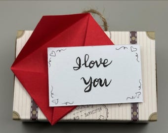 Tarjeta de felicitación y recuerdo escrita a mano con la frase "Te quiero"