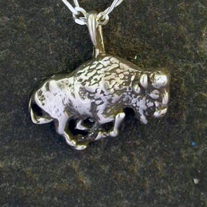 Sterling Silver Running Bison Pendant on Sterling Silver Chain.