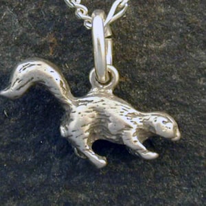 Sterling Silver Skunk Pendant on Sterling Silver Chain.