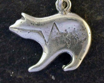 Sterling Silver Spirit Bear Pendant on a Sterling Silver Chain.