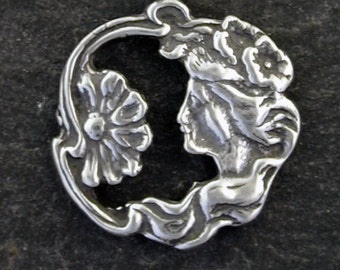 Sterling Silver Lady with Flower Pendant on a Sterling Silver Chain.