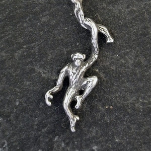 Sterling Silver Monkey Pendant on a Sterling Silver Chain.