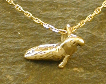 14K Gold Tiny Elephant Seal Pendant on a 14K Gold Chain