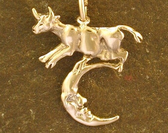14K Gold Tiny Milk Cow Jumping over the Moon Pendant on a 14K Gold Chain.