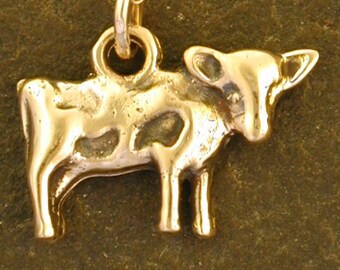 14K Gold  Cow Pendant on a 14K Gold Chain.