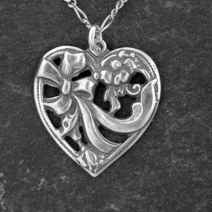 Sterling Silver Heart Pendant on Sterling Silver Chain.