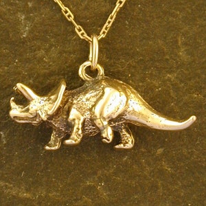 14K Gold Ttriceratops Dinosaur Pendant on a 14K Gold Chain.