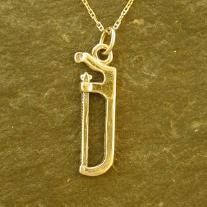 14K Gold Hack Saw Pendant on a 14K Gold Chain image 1