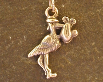 14K Gold Stork and Baby Pendant on a 14K Gold Chain.