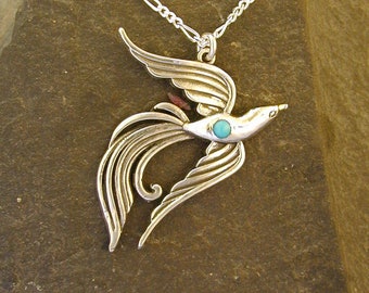 Sterling Silver Phoenix Pendant with Tourquoise on a Sterling Silver Chain.