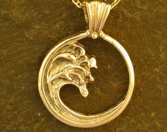 14K Gold Wave Pendant on a 14K Gold Chain