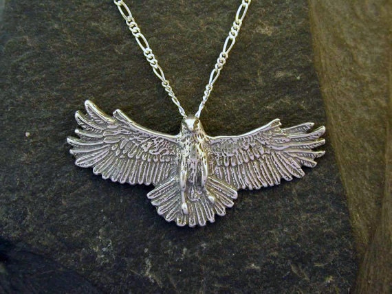 Hawk pendant best sale necklace