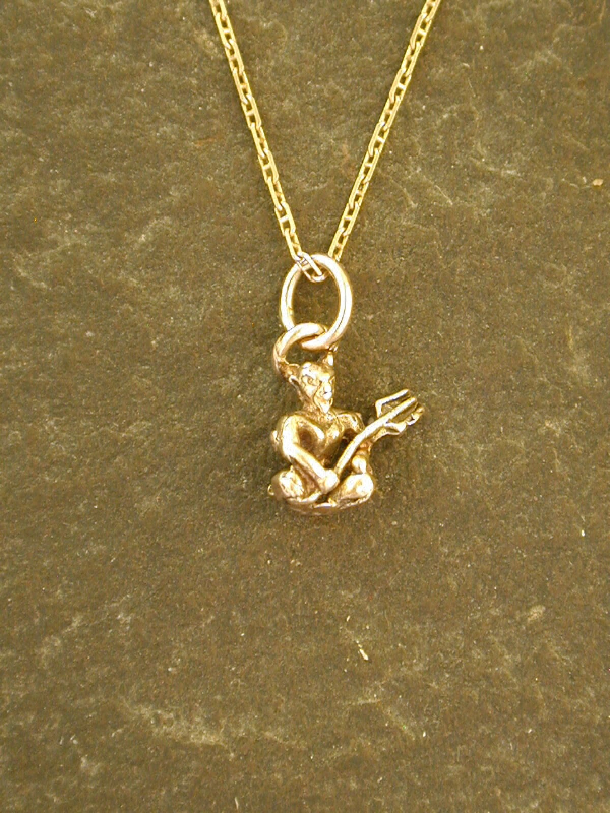 Gold devil pendant clearance